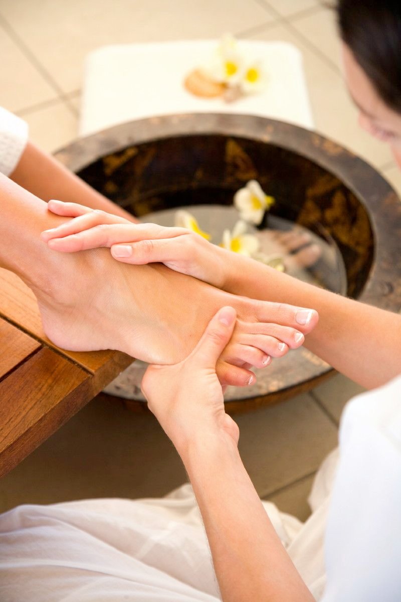 Foot reflexology treatment at a professional wellness spa in Hadapsar, pune